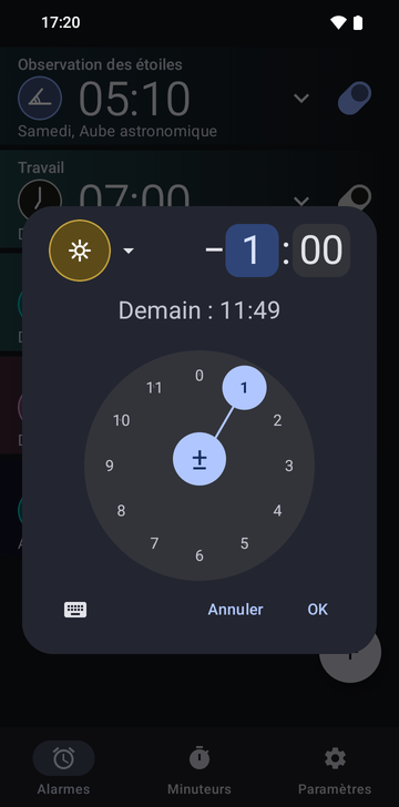La boîte de création d’alarme de Risetime, ouverte par-dessus la liste : la pastille d’ancre Midi, un décalage de moins 1 heure et 00 minute avec le champ des heures sélectionné, et la ligne Demain : 11:49. Un cadran d’heures circulaire avec 1 sélectionné occupe la moitié basse, avec Annuler et OK en dessous.