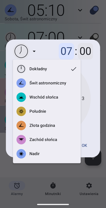Okno tworzenia alarmu z otwartym menu kotwic: Dokładny, Świt astronomiczny, Wschód słońca, Południe, Złota godzina, Zachód słońca i Nadir.