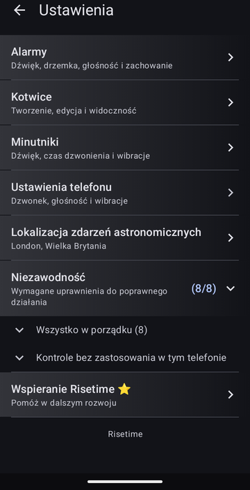 Ekran ustawień Risetime, z wierszami Alarmy, Kotwice, Minutniki, Ustawienia telefonu i Lokalizacja zdarzeń astronomicznych ustawioną na London, Wielka Brytania. Wiersz Niezawodność pokazuje (8/8) i jest rozwinięty na Wszystko w porządku (8) oraz Kontrole bez zastosowania w tym telefonie. Poniżej znajduje się Wspieranie Risetime, a stopka pokazuje Risetime.