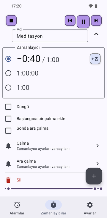 Risetime uygulamasının Zamanlayıcılar sekmesinde açılmış Meditation dizisi: üç zamanlayıcı, −0:40 / 1:00 seçili, 1:00:00 ve 1:00; Loop, Add a ring at the start ve Intermediate ring at the end işaretsiz; Ring ve Intermediate ring satırları Timer settings default değerinde.